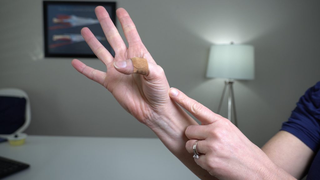 Band-aid used to stop trigger thumb