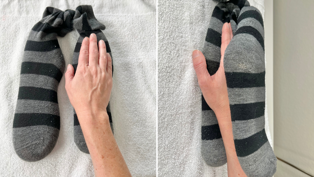 DIY hot pack placed vertical on hand and wrist